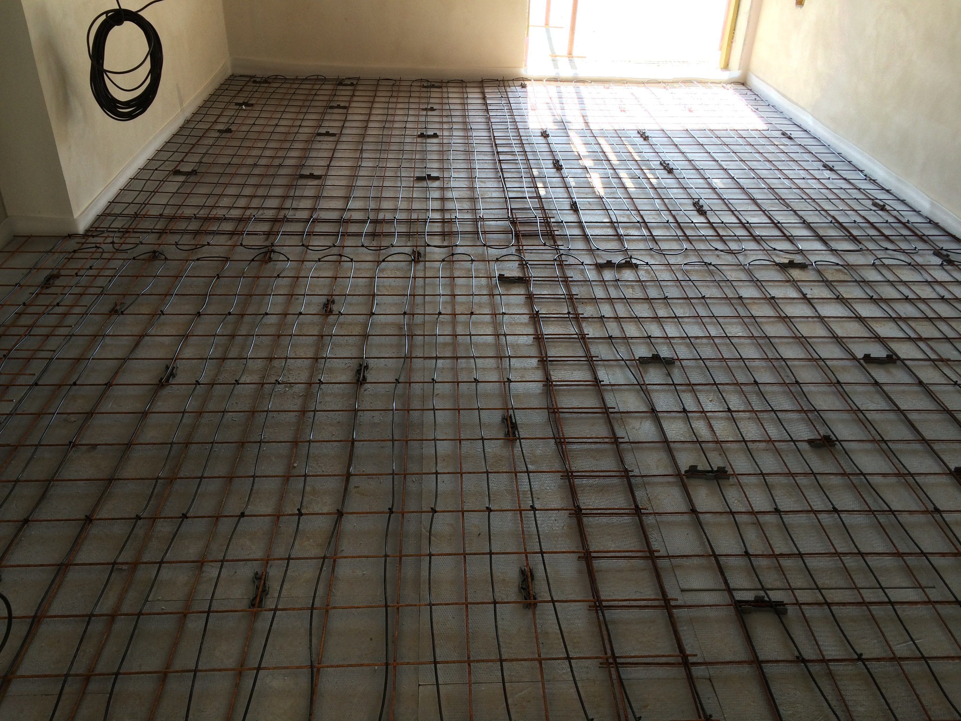 Temperov�n� heliportu a spojovac� chodby Plze�